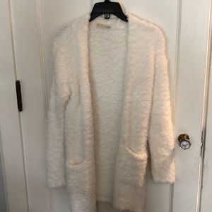 Cream colored cardigan sweater